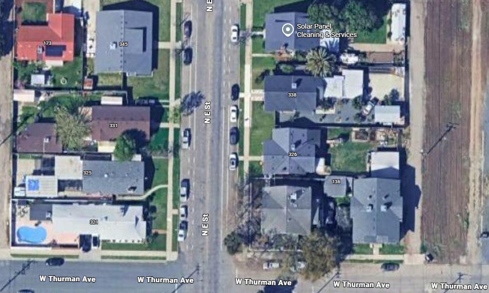 istorical satellite images of a residential house used to compare roof appearance and estimate when it was replaced.